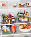 Smooth Spin Rectangular Lazy Susan Turntable Keeps Your Kitchen Super Slick And Totally Stress Free For Fridge Condiments Spices Pantry Jars And Countertop Organization Without Any Fuss. Clear plastic turntable in fridge with jars, sauces, and apples.