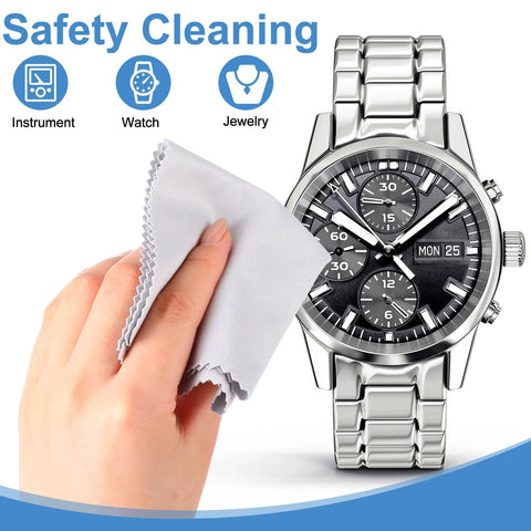 Hand using Gentle Microfiber Cleaning Cloths For Glasses And Electronics Pack Of 50 Pcs to clean a stainless steel watch