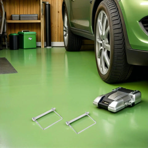 Garage setting with car and Six Pack 4 Inch Heavy Duty Stainless Steel Wire Lock Hitch Pin Quick Release Safety Lock on the floor.