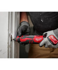 Pro Grade M12 Cordless Brushless Rotary Tool With Snappy Variable Speed Dial And 12 Precision Settings Delivering Knockout RPMs For Rough Demolition And Detail Jobs Bare Tool in use for precision cutting.