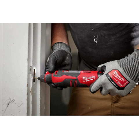 Pro Grade M12 Cordless Brushless Rotary Tool With Snappy Variable Speed Dial And 12 Precision Settings Delivering Knockout RPMs For Rough Demolition And Detail Jobs Bare Tool in use for precision cutting.