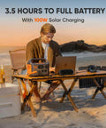Person using Beast Portable Solar Generator Explorer 300 Power Station 292Wh With 40W Solar Panel on beach at sunset