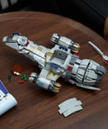 Epic Sci-Fi Spaceship Building Set For Adults, 1345-Piece Space War Ship Model on table with additional pieces