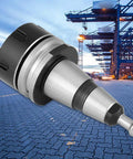 Rock Solid ISO30 ER32 Balance Collet Chuck For Cnc Milling And Lathe Work Built Heavy Duty With Stainless Steel on industrial background.