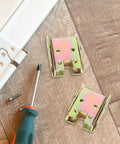 Four Sets Golden Metal Folding Cabinet Door Hinges 90 Degree Self Locking Mechanism with screwdriver on wood surface