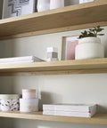 White Oak Veneer Edge Banding Tape 7 8 Inch Roll 250 Feet Pre Glued Iron On With Hot Melt Adhesive applied on wood shelves