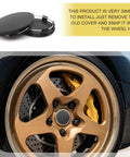 4 Pack Universal Car Wheel Center Caps Sixty Millimeter Outer Diameter Fifty Six Millimeter Inner Bore Tough As Nails ABS Plastic Snap On Rim Hub Caps shown on gold alloy wheel.
