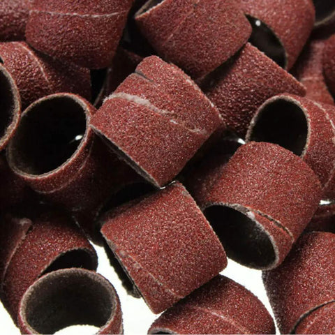 Heavy Duty Sander Drum Mandrel With Ten Badass 80 Grit Sanding Bands For Multi Material Grinding And Nail Drill Slick Rotary Accessory Set rubber sanding bands piled together.