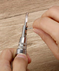 Hands adjusting 7 In 1 Pro Grade Leather Groover Tool And Cutting Knife Set for DIY leathercraft on wooden surface