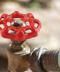 No Fuss Cast Iron Faucet Handle With Bold Red Wheel Grip on a garden valve, 43mm OD, heavy duty, rust resistant.