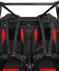 Fresh Ride Two Seater Click Six Harness Kit For Atv And Side By Side Rigs Featuring Plug And Play Safety Restraints With Non Snag Straps And Boss Grade Quick Release Buckles For Gnarly Trails in red and black seats with harnesses.