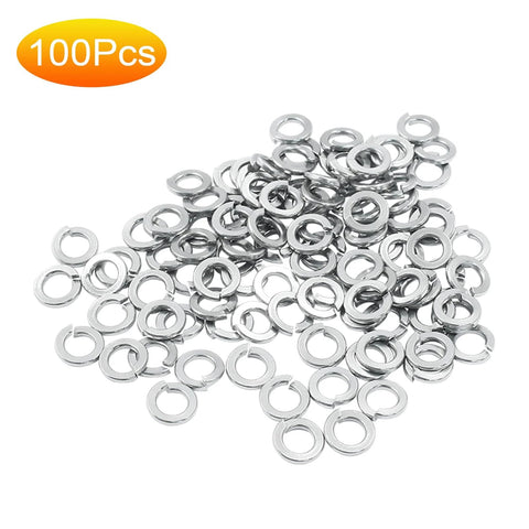 Pile of 100 stainless steel #8 split lock washers on white background