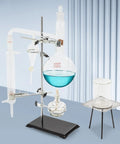 All In One 1000ml Distillation Kit With Glass Apparatus For Essential Oil Extraction And Water Distillation High Borosilicate Glassware With Iron Stand Pro Grade Lab Gear For Home Or School displayed in setup