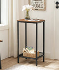 Built Tough Industrial Tall Side Table Featuring Adjustable Mesh Shelves And Rugged Steel Frame Works Like A Charm As A Tall Nightstand For Your Rustic Brown Living Room Setup, showcasing a flower vase and glasses.