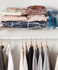 Vacuum Storage Bags Large 5 Pack With Hand Pump For Clothes And Linens stacked on closet shelf