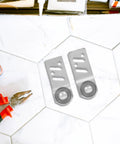 Four Pack Stainless Steel Sliding Door Pulley Wheels With Internal Ball Bearings For A Rock Solid Build And Runs Like A Dream Rail Glide featuring two wheels on a tiled floor.