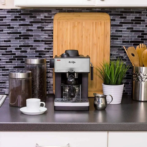 The Real Deal 4 Cup Steam Espresso System With Built In Frothing Arm For Rich Coffee And Creamy Lattes Easy Peasy Setup in kitchen.