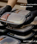 MidKnight Disposable Nitrile Gloves Black Full Textured Grip used for food handling, showing gloves in use with containers