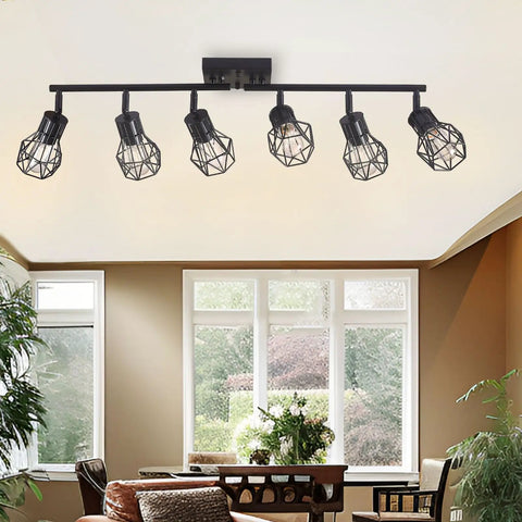 Black 6 Light Farmhouse Track Lighting Fixture with Metal Cage Design installed in a living room ceiling