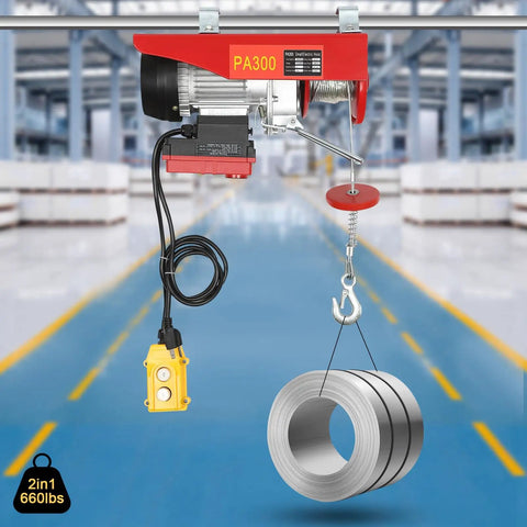 650 Watt Electric Cable Hoist 660 Lbs Capacity With Wireless Remote Control lifting steel coils in warehouse setting.