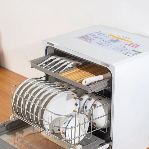 Skip the Sink Fully Automatic Desktop Dishwasher For Home Kitchen Large Capacity Auto Wash System With Triple Filter And Front Loading Design Easy Setup Plumbing Free Hands Off Cleanup Routine with dishes in rack.