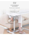 Slick Height Adjustable Laptop Table With Smooth Rolling Locking Casters showing manual adjustment feature near couch.