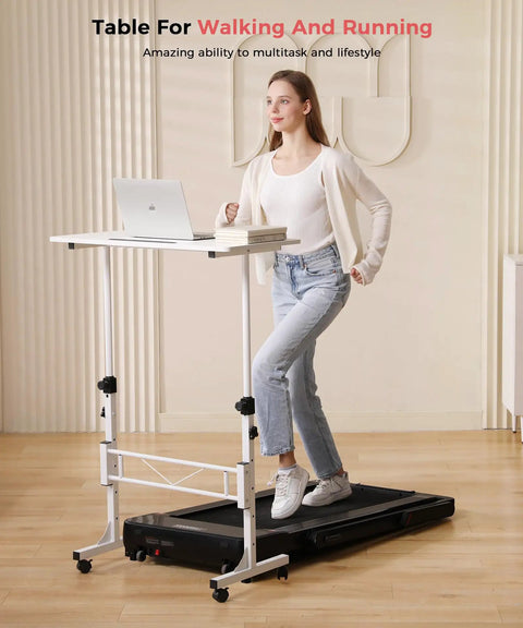 Standing Desk On Wheels Adjustable Height Sit Stand Desk Portable Rolling Laptop Desk White in use with a treadmill for multitasking.