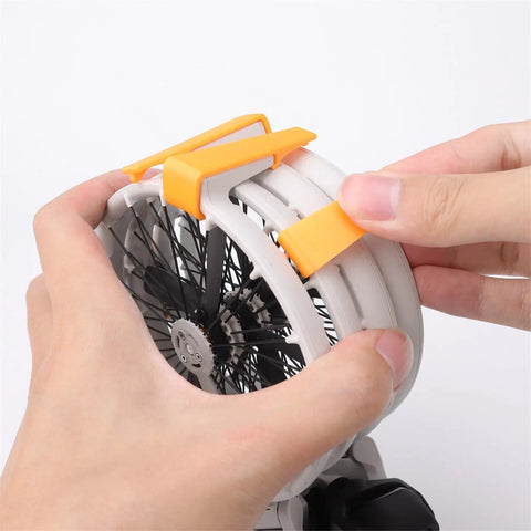 Hands attaching Ultra Light Drone Landing Gear Extension Kit For DJI Flip with Quick Release Legs, 3D printed, 2.6cm height boost.