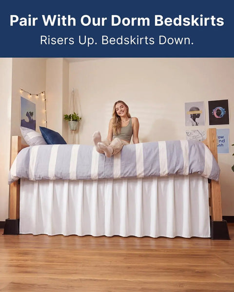 Dorm room with bed elevated on Durable Bed Risers For Dorm Rooms With 3 And 5 Inch Heights, Stackable To 8 Inches, supporting bedskirt.