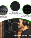 Person using the Foldable Microphone Isolation Shield With Stand And Pop Filter For Condenser Mics In Home Studio, High Density Foam
