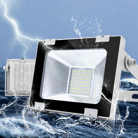 JUDYSSY 12 Pack 30W Led Floodlight Outdoor, 3000Lm showing water-resistant design in outdoor setting.