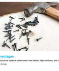 Hella Durable Metal Tack Nails 500 Piece Set Tight Grip Hardware Studs arranged on wood, ideal for wood projects and repairs.