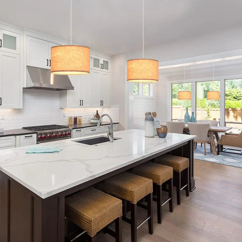 2 Pack Plug In Pendant Lights With 15Ft Clear Cord Toggle Switch Beige Linen Shade Modern Hanging Lamp over a kitchen island.