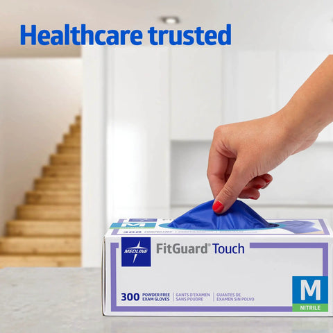 Medium Nitrile Exam Gloves, 300 Pack, Powder Free And Latex Free, hand pulling gloves from box for caregiving tasks.