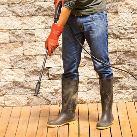 Person wearing Double Dipped PVC Chemical Resistant Gloves With Rugged Grip And Seamless Cotton Liner 12 Inch Length