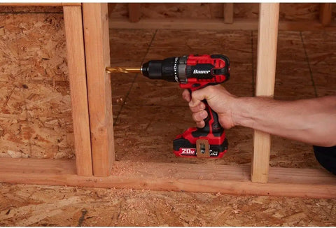 Man using 20V Hypermax Cordless Drill Driver Kit With Half Inch Chuck Two Speed Hammer Drill for fastening wood frame.