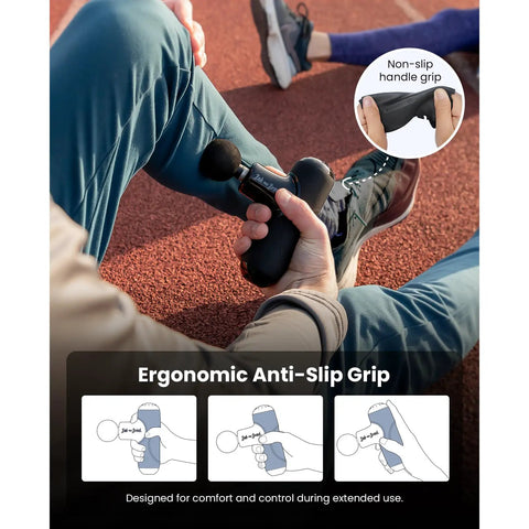 Person using Q2 Ultra Mini Massage Gun With Red Light Infrared Heat Head Pocket Sized Percussion Massager on leg for muscle relief.