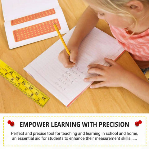 Child writing math equations with pencil, Foldable Meter Stick Ruler 36 Inch Go To Classroom Tool For Measuring visible on desk.