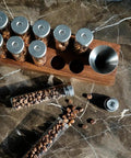 12 Piece Single Dose Coffee Bean Storage Tubes With One Way Exhaust Valve Glass Vials On Sturdy Walnut Wood Base and Easy Pouring Funnel
