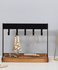 Solid Five Hook Table Key Holder With Torched Wood Base And Rustic Industrial Countertop Rack Knocks Out Clutter Keeps essentials like jewelry tidy.