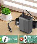 18V 2A Jump Starter Power Supply for JP 12 4000T 5000T 10000T Start All Corded Jump Packs on wooden table