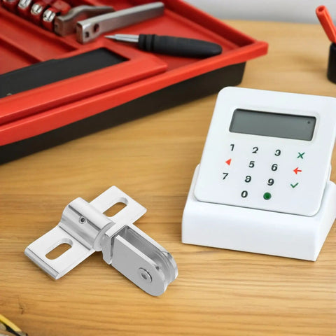 2 Pack Glass Shower Door Pivot Hinges Set, durable alloy fitting on a desk with tools in the background