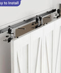 Bi Folding Sliding Barn Door Hardware Kit For Four Doors With Top Mount Track in black finish, installed on white doors