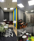 High Density Soundproof Foam Panels With Hella Strong Self Adhesive Backing For Zero Drama Home Studio Acoustic Dampening Treatment Tiles Full Surface Matte Black in a home studio with drum set and computer setup