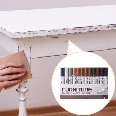 Close-up of 12 Color Wood Marker Set For Furniture Repair, covering scuffs on a white table with natural finish and quick concealment.