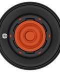 Urinal diaphragm assembly, top-down view, 0.5 GPF, orange center with black mounting ring.