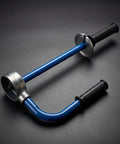No Sweat Packing Heavy Duty Manual Stretch Film Dispenser Ergonomic Handheld Pallet Wrap Tool with knuckle saving grips on black surface.