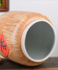 Heavy Duty Ceramic Grain Dispenser Jar With Secure Locking Lid, showcasing the intricate wood-grain design and spacious interior.