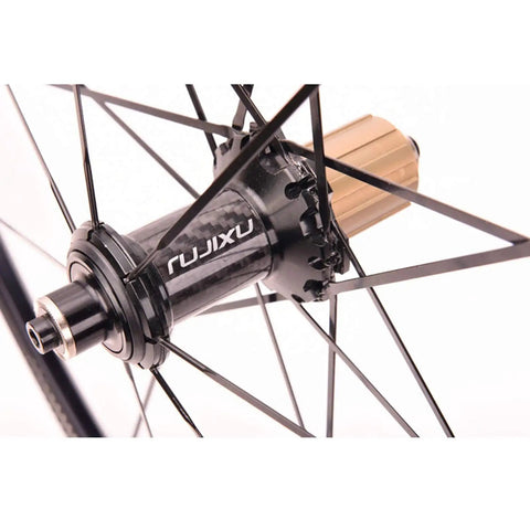 Close-up of carbon hub on Ultralight 700C Road Bike Wheelset With Carbon Hub For Climbing Beasts 2 To 1 Spoke Ratio V Brake Quick Release.