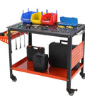 Heavy Duty Mobile Welding Table And Workbench For Garage And Shop Steel Platform with tools and storage bins on a rolling cart.